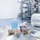 Realistic mono PE FFS film roll and small packaging samples on a packaging line